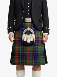 Person wearing a traditional Scottish kilt with a sporran on a white background