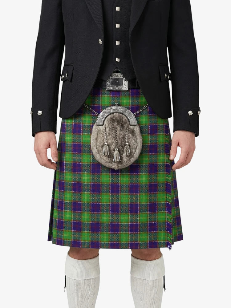 Person wearing a traditional Scottish kilt with a tartan pattern on a white background