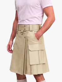 A beige faux-leather kilt with a matching belt, silver-tone hardware, and large cargo pockets, shown on a model wearing a light pink t-shirt.