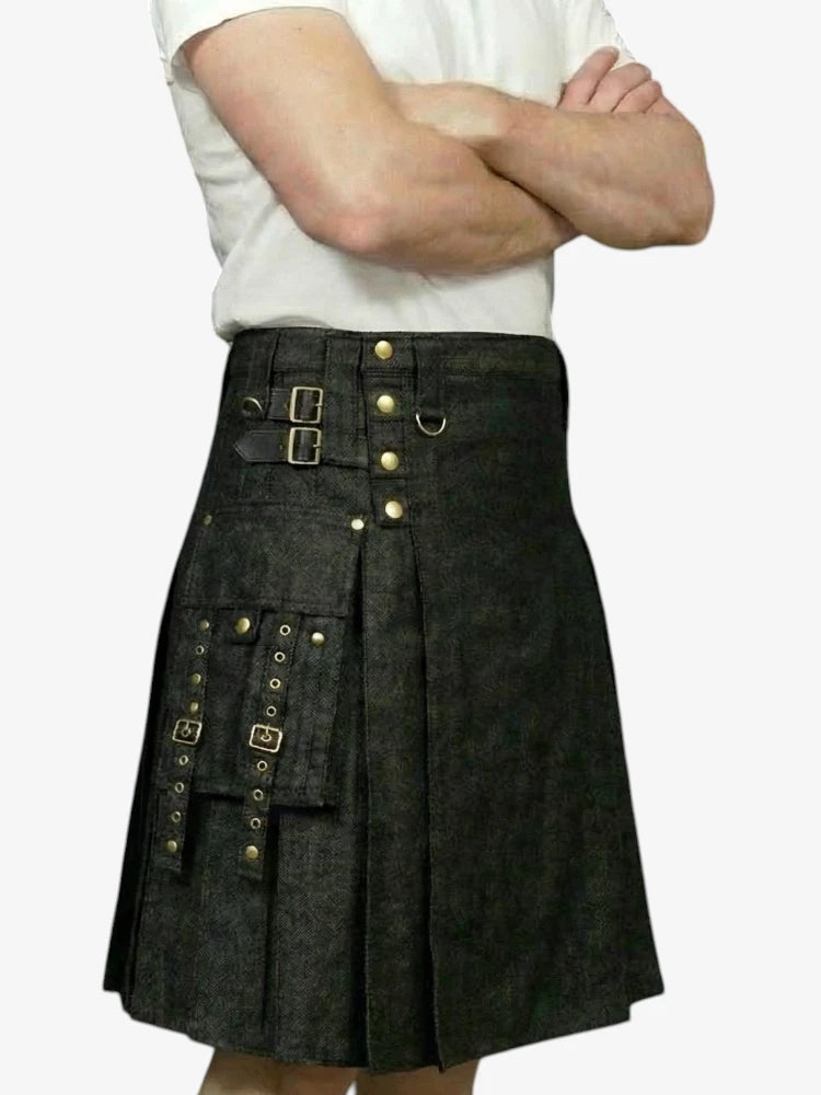Person wearing a black kilt with gold buttons on a white background