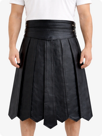 Black pleated skirt worn by a person on a white background