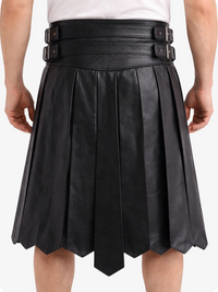 Black pleated leather skirt with belt on a white background