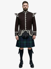 Man wearing a traditional Scottish black watch tartan kilt with a dark brown jacket on a white background