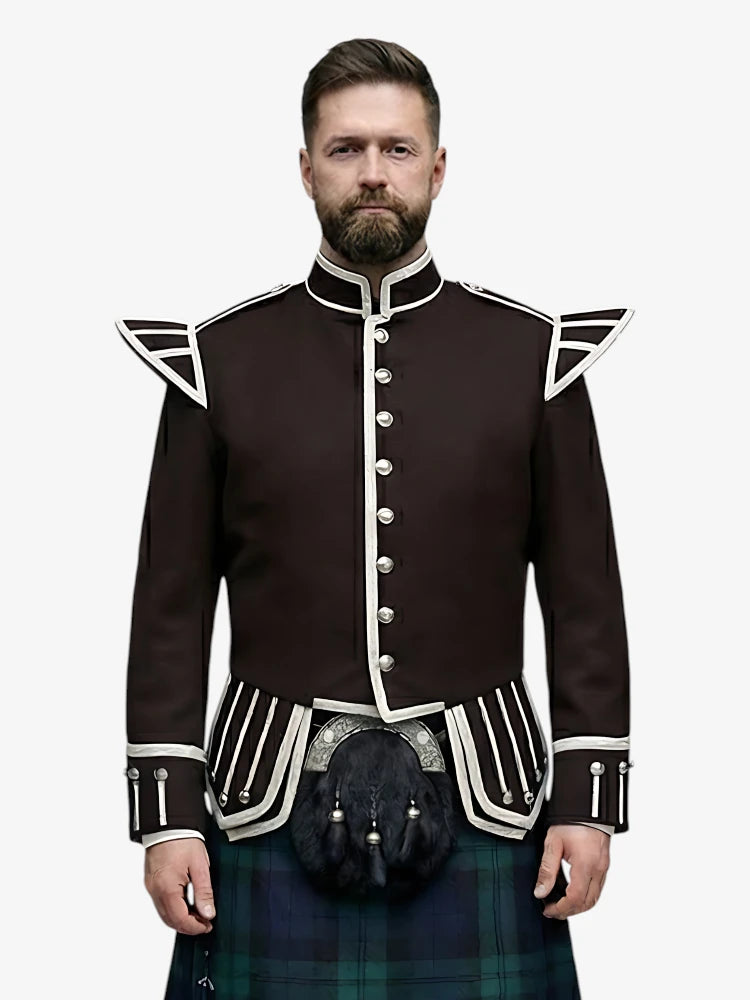 Man wearing a traditional Scottish black watch tartan kilt with a dark brown jacket on a white background