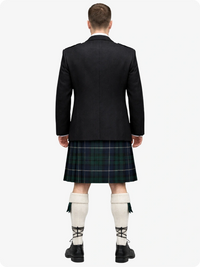 Person wearing a black blazer and plaid kilt on a white background