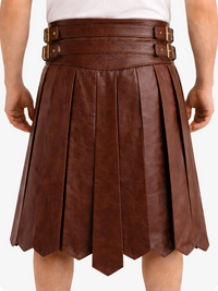 Brown leather skirt with belt and buckles on a white background
