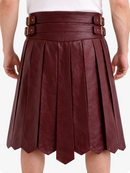 Burgundy pleated skirt with belt on a white background