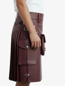 Burgundy leather skirt with a pocket on a white background