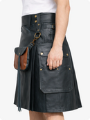 Charcoal leather kilt with gold buttons and a brown leather pouch on a white background