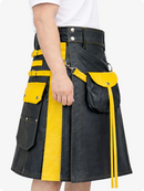 Charcoal and yellow kilt worn by a person on a white background