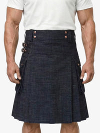 Man wearing a navy denim kilt on a white background