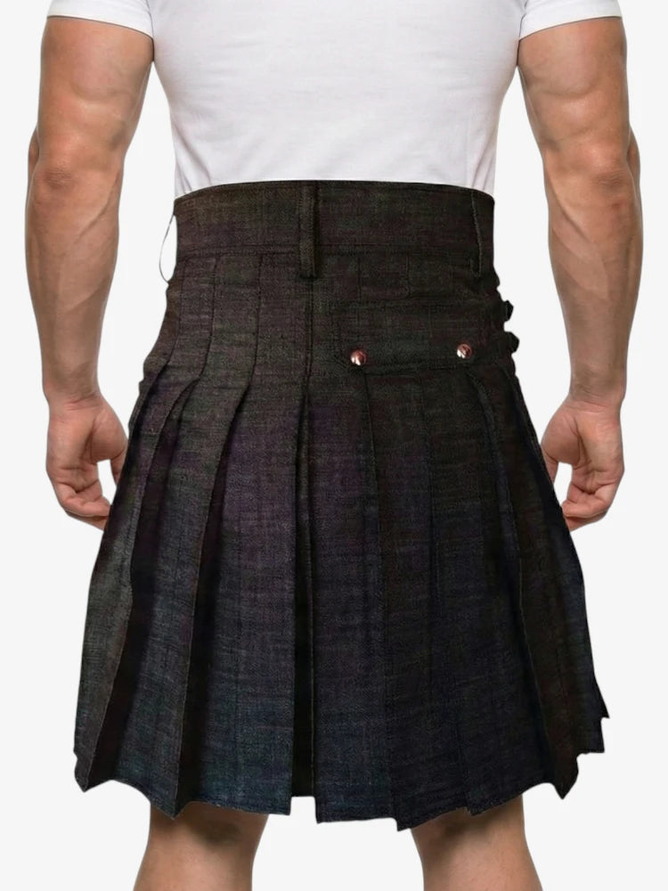 Person wearing a dark plaid kilt on a white background