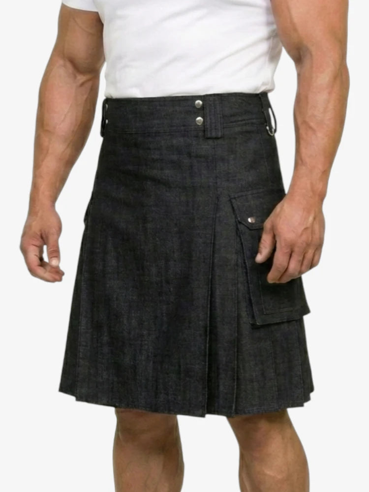 Person wearing a black denim kilt on a white background