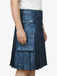 Blue denim kilt worn by a person on a white background