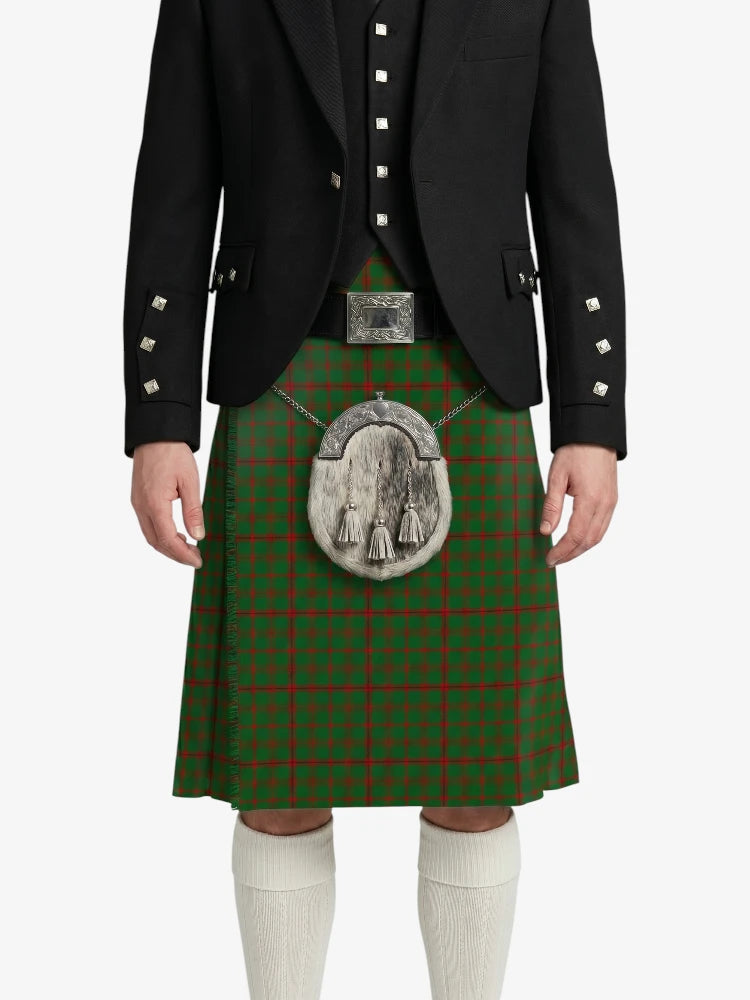 Person wearing a green tartan kilt with a black jacket on a white background