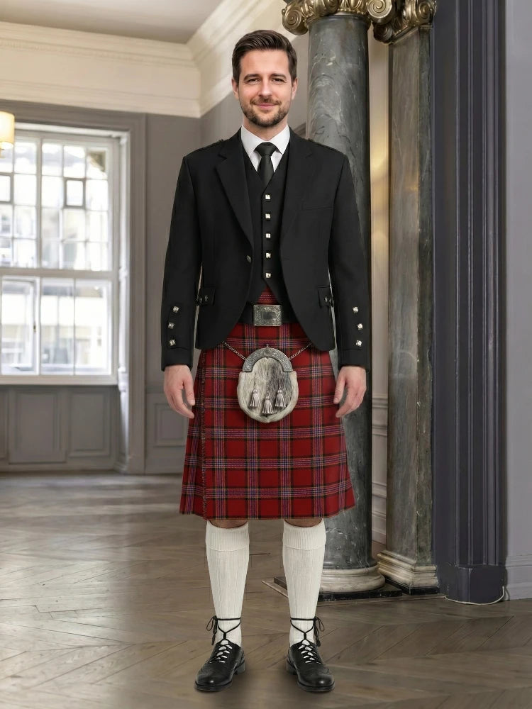 Man wearing a traditional Scottish kilt in an elegant interior setting