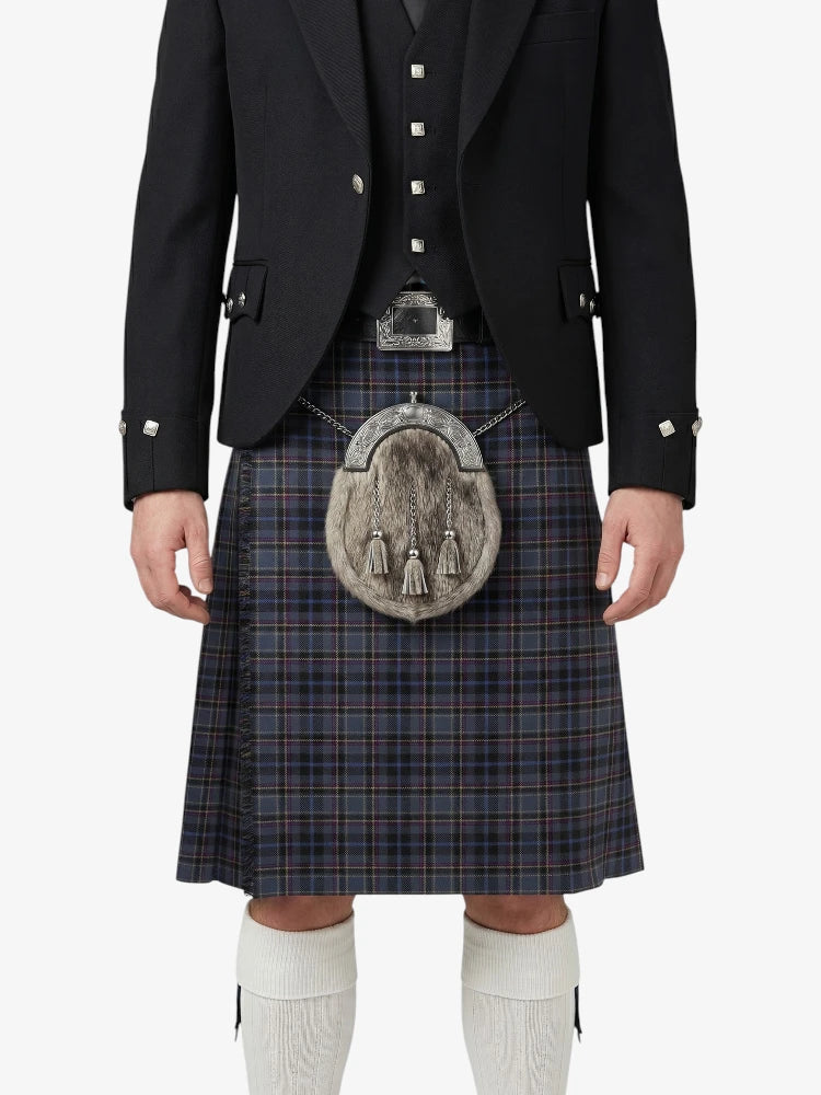Traditional Scottish kilt with a dark plaid pattern worn by a person on a white background