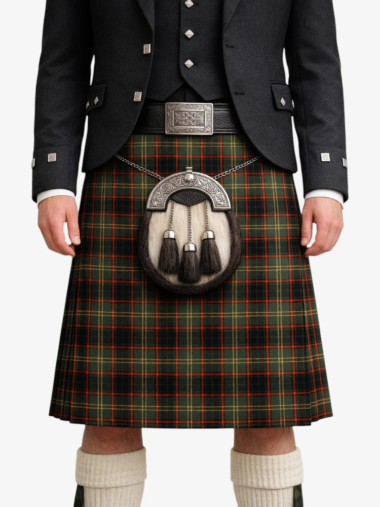 Person wearing a traditional Scottish kilt with a tartan pattern on a white background