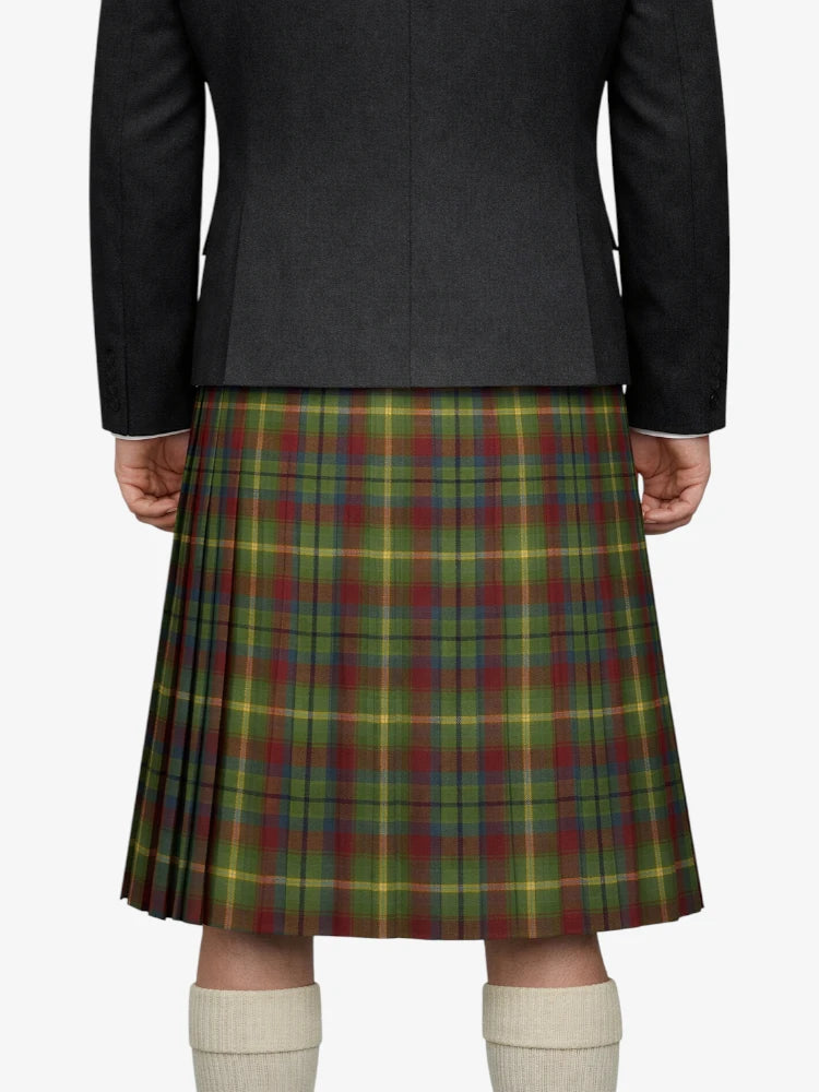 Person wearing a dark gray jacket and a plaid kilt on a white background