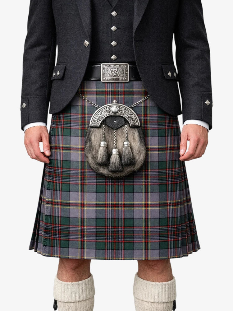 Person wearing a traditional Scottish kilt with a jacket and white socks on a white background