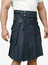 Person wearing a blue kilt with metal accents on a white background