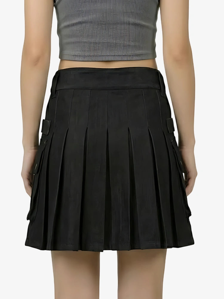 Black pleated skirt worn by a person on a white background