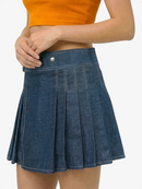 Blue pleated skirt worn by a person on a white background