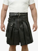 Black leather kilt with multiple pockets and zippers worn by a person on a white background