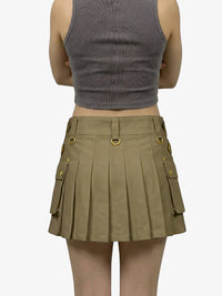 Person wearing a brown pleated skirt with pockets on a white background