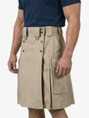Beige cargo shorts worn by a person on a white background