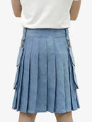 Blue pleated skirt worn by a person on a white background