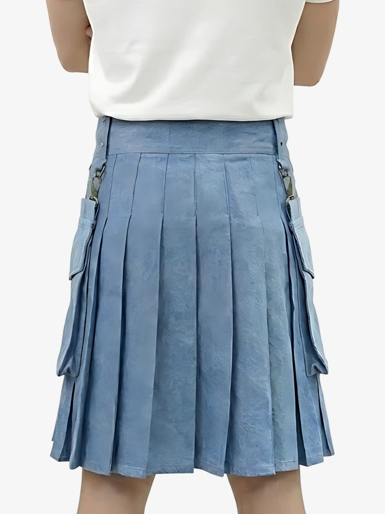 Blue pleated skirt worn by a person on a white background