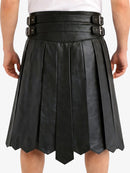 Black pleated leather skirt with belt on a white background