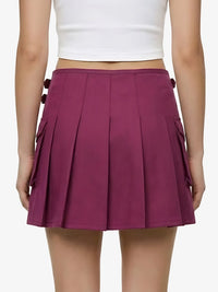 Purple pleated skirt worn by a person on a white background
