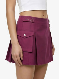 Purple skirt with a white top on a plain background