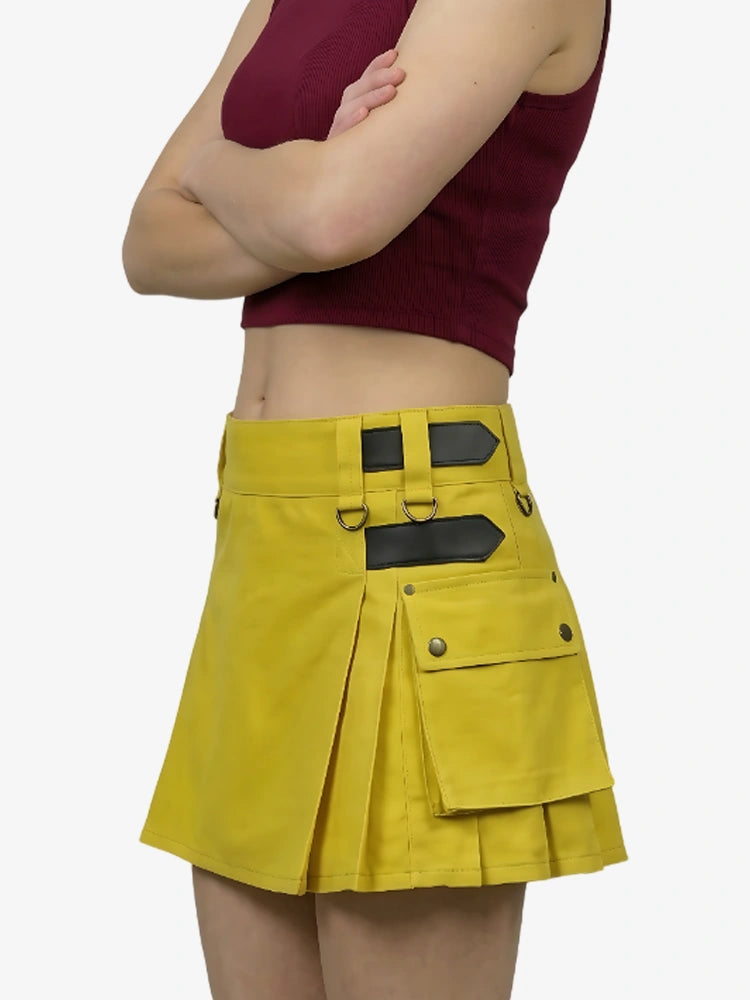 Yellow skirt with black accents worn by a person on a white background