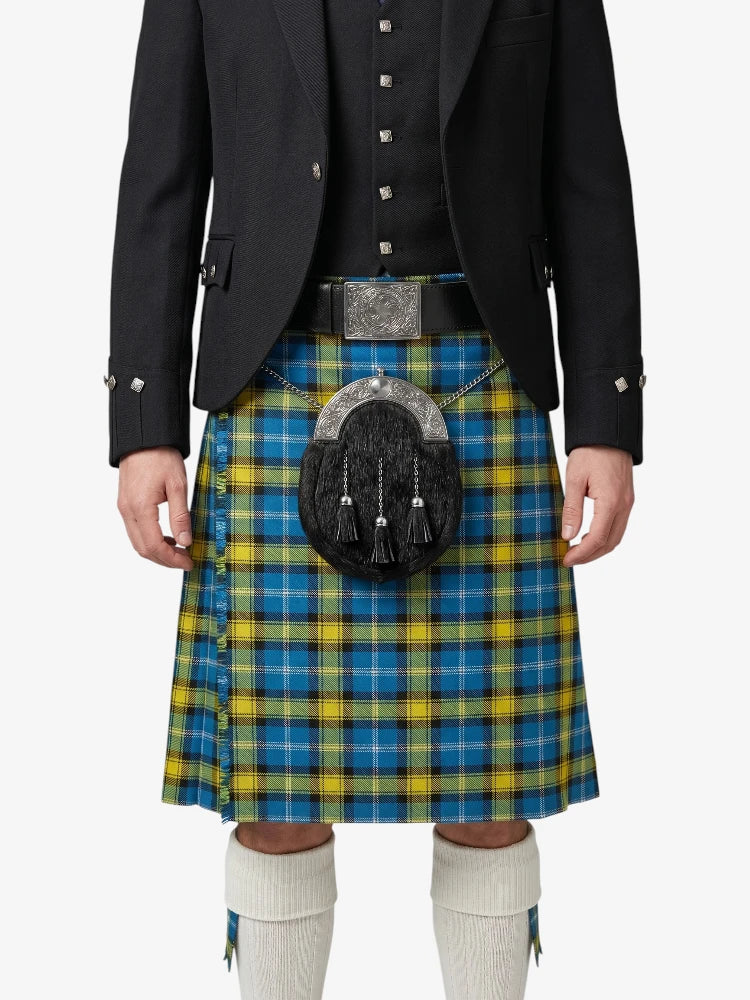 Person wearing a blue and yellow plaid kilt with a black jacket on a white background