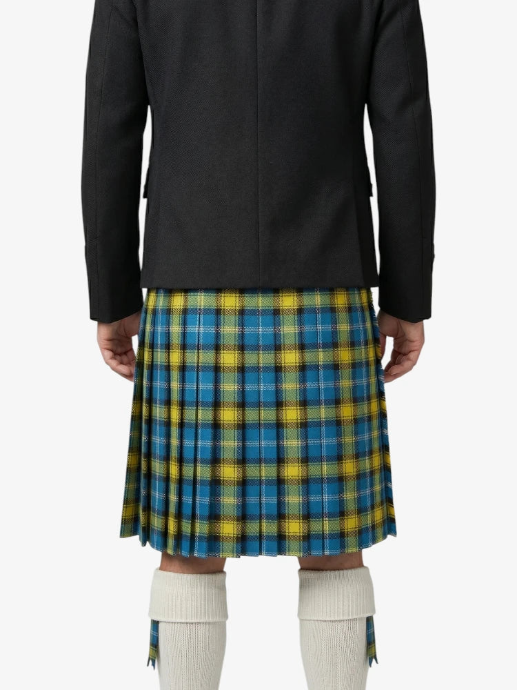 Person wearing a black coat over a blue and yellow plaid kilt on a white background