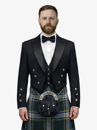Man wearing a formal black prince charlie jacket with a dress gordon tartan plaid kilt on a white background