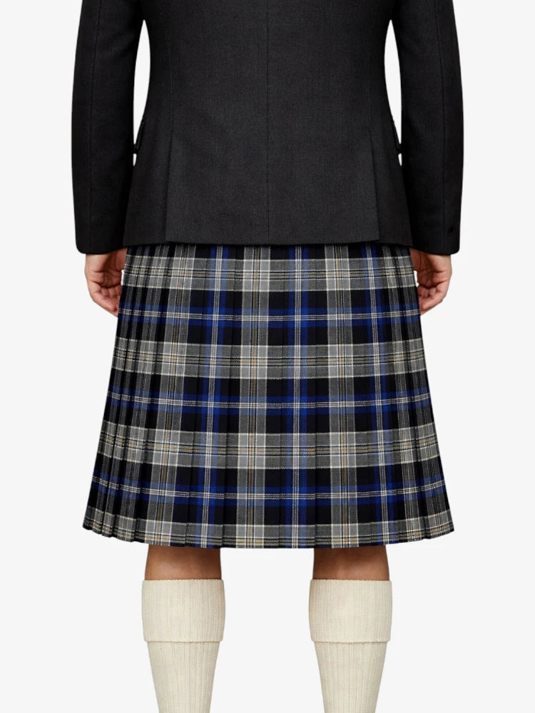 Person wearing a black jacket and plaid kilt on a white background