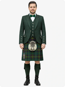 Man wearing a traditional Scottish kilt with a green jacket and tartan skirt on a white background