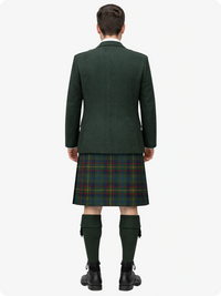 Person wearing a green jacket and tartan kilt on a white background