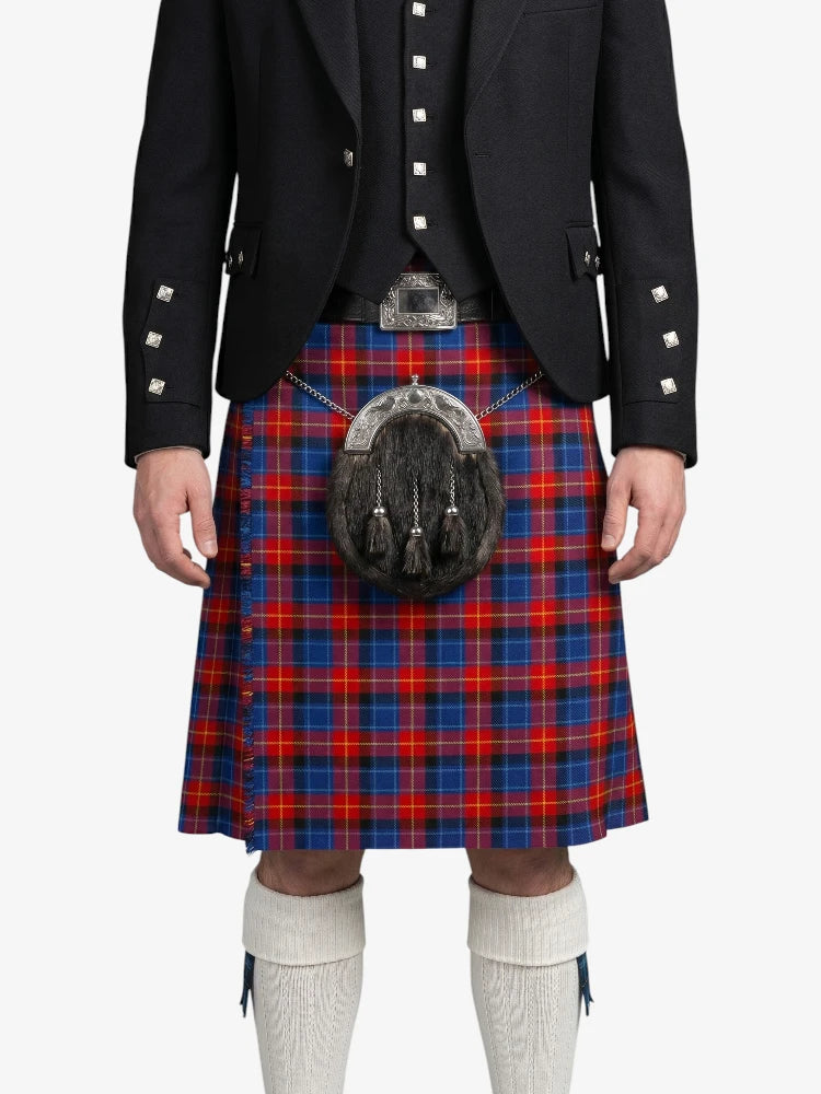 Person wearing a black jacket with silver buttons and a red and blue plaid kilt on a white background