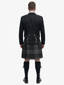 Person wearing a Highland grey watch tartan kilt and a black prince charlie jacket with a white background