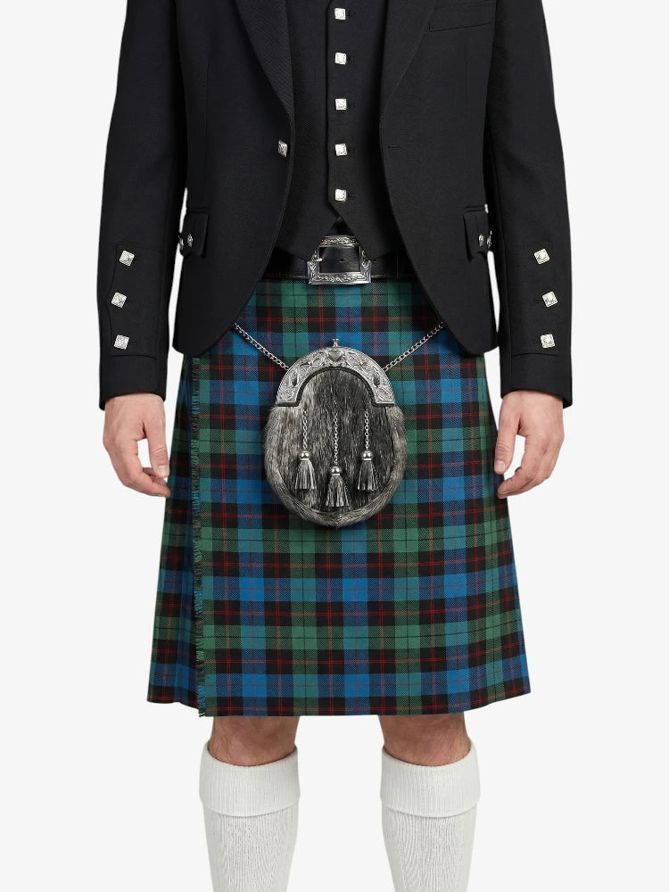 Person wearing a black jacket and tartan kilt with a silver sporran on a white background