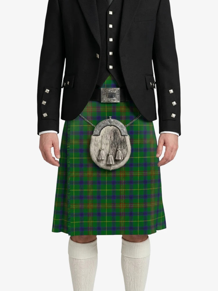 Person wearing a traditional Scottish kilt with a black jacket on a white background