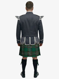 Person wearing a traditional Scottish irish national tartan kilt with a gray jacket on a white background