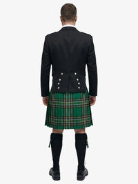 Person wearing a black prince charlie jacket and irish national tartan kilt on a white background