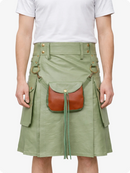 Person wearing a light green kilt with a brown leather pouch 