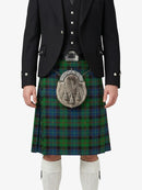 Person wearing a traditional Scottish kilt with a sporran on a white background